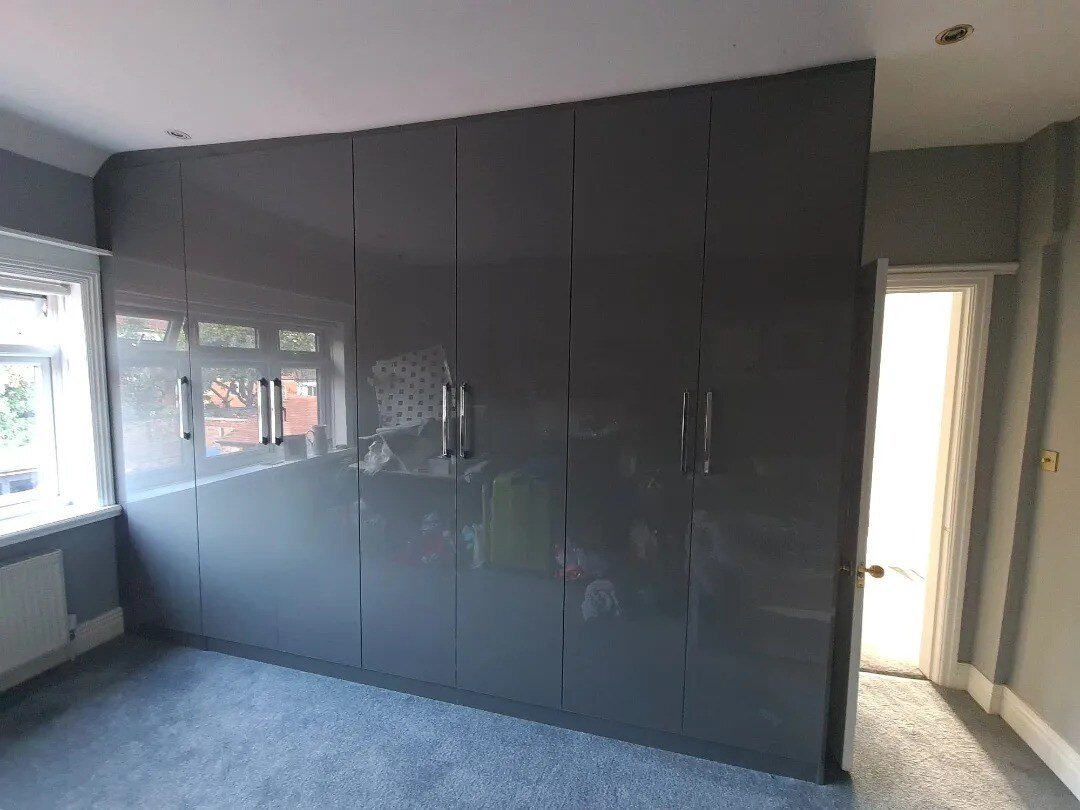 Dark grey modular fitted wardrobes in a modern Warrington bedroom
