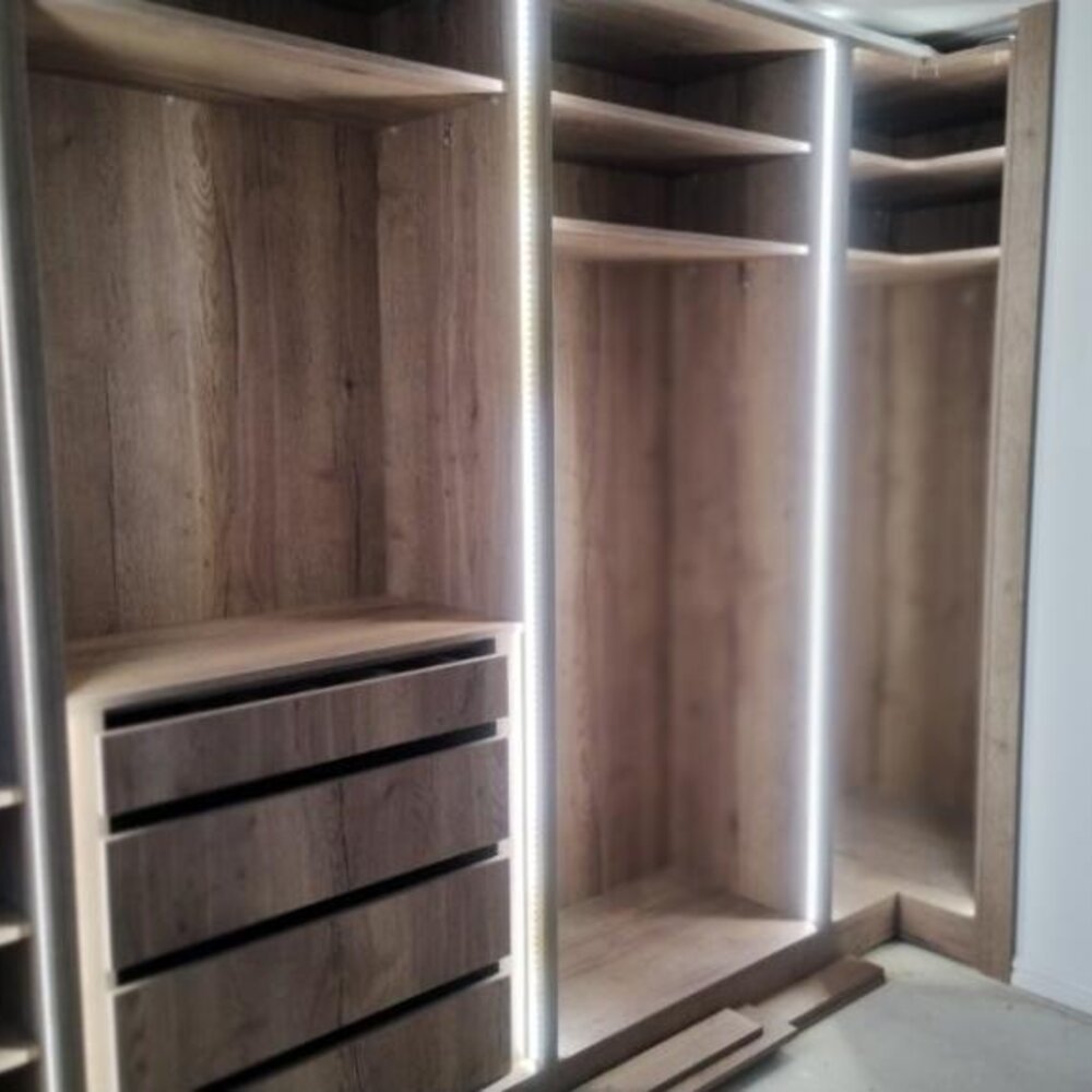 Fitted wardrobe interior with integrated lighting