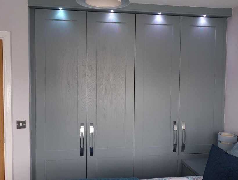 Bespoke grey shaker fitted wardrobes with chrome handles by the family-run WOW Wardrobes team in Cheshire