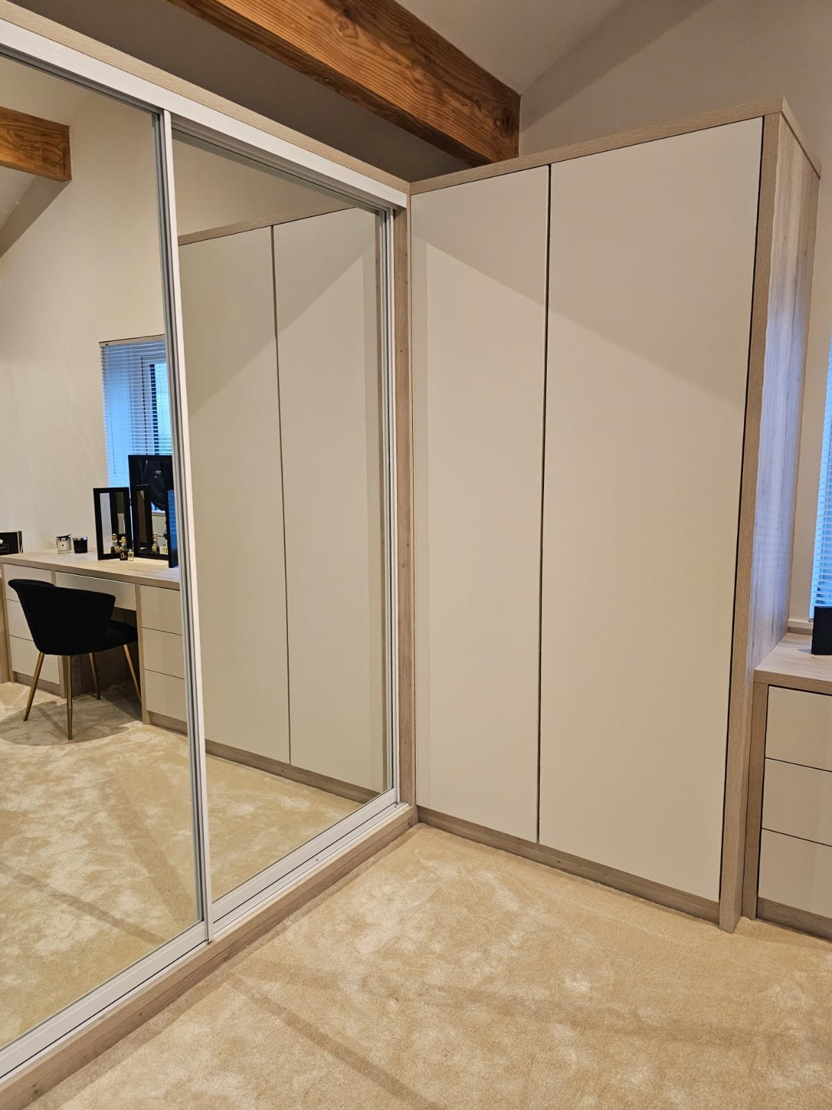 Fitted wardrobe doors in a real bedroom