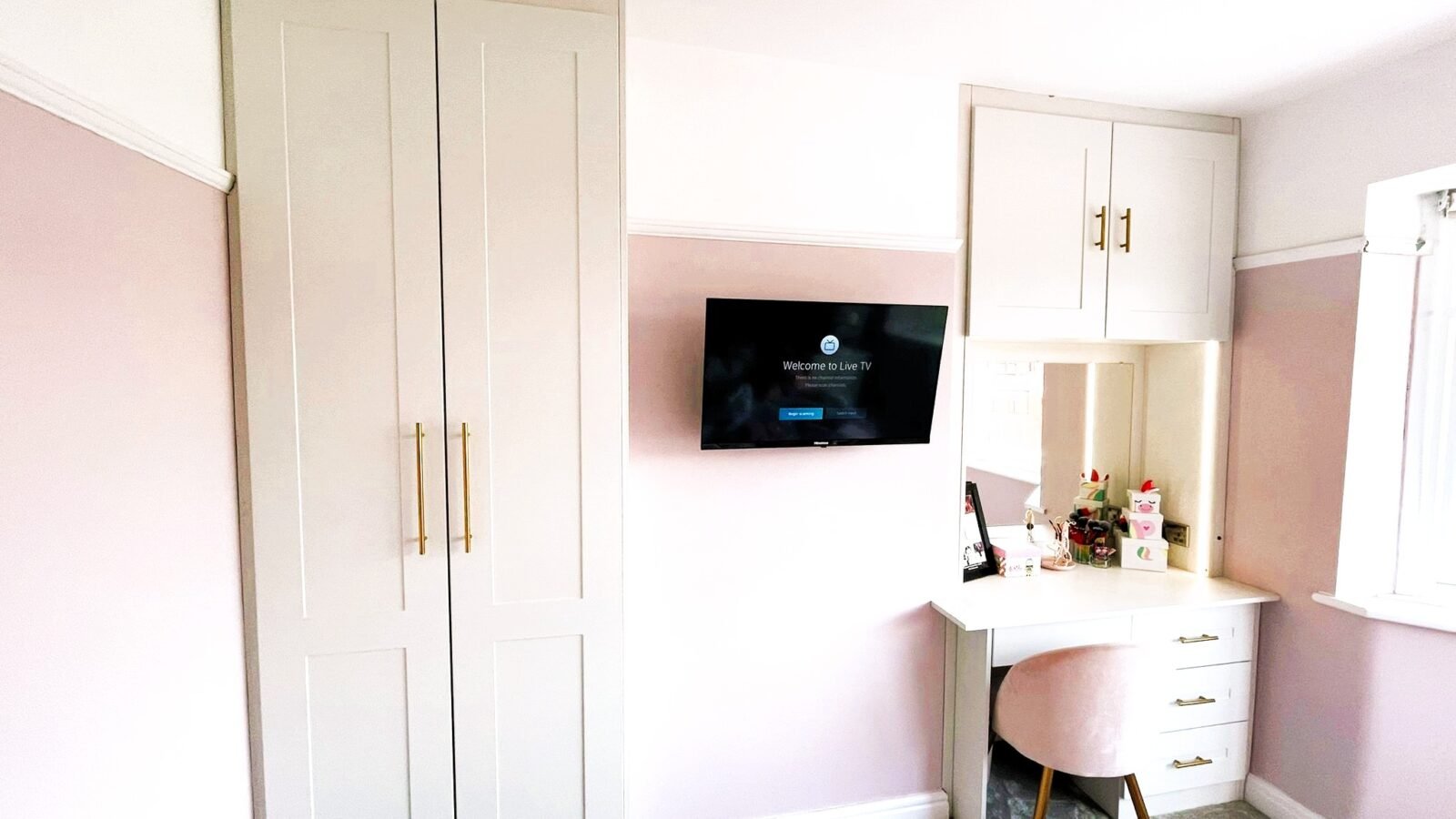 Fitted alcove wardrobes and dressing table built around a chimney breast in a Warrington bedroom