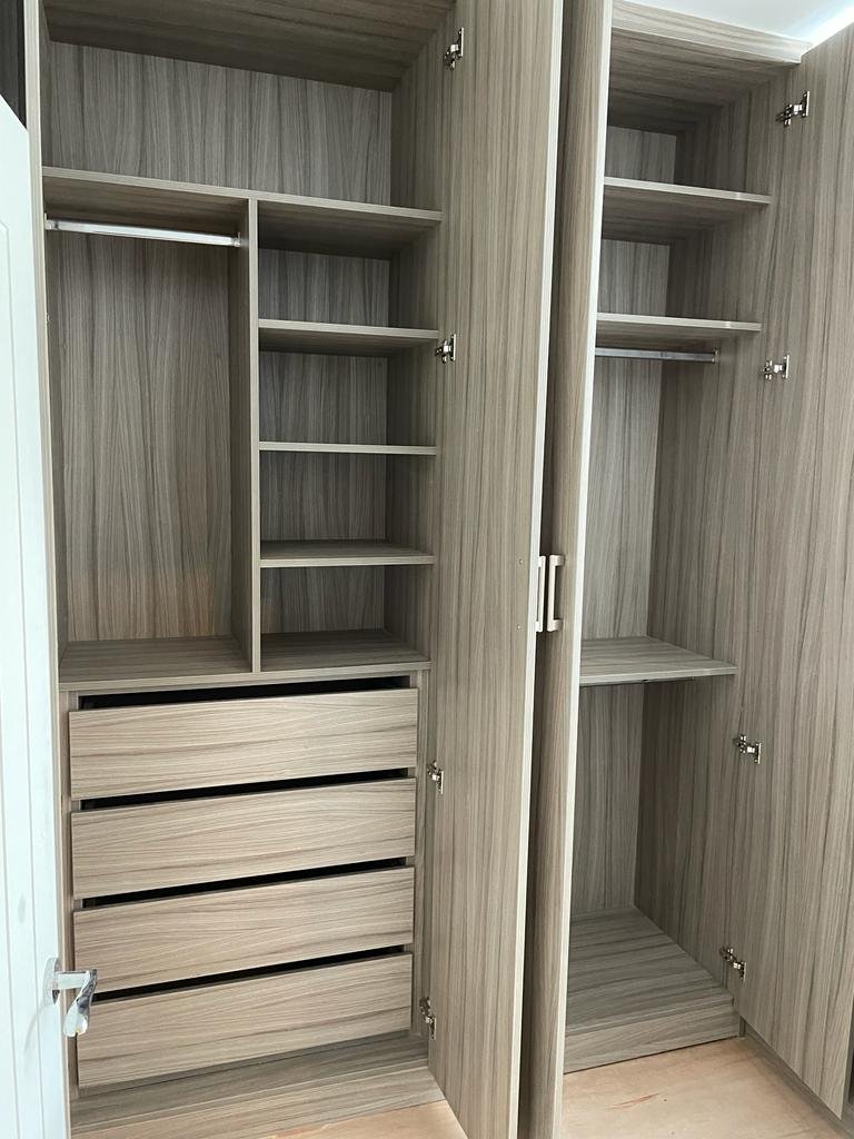 Hinged fitted wardrobe doors with full access to storage