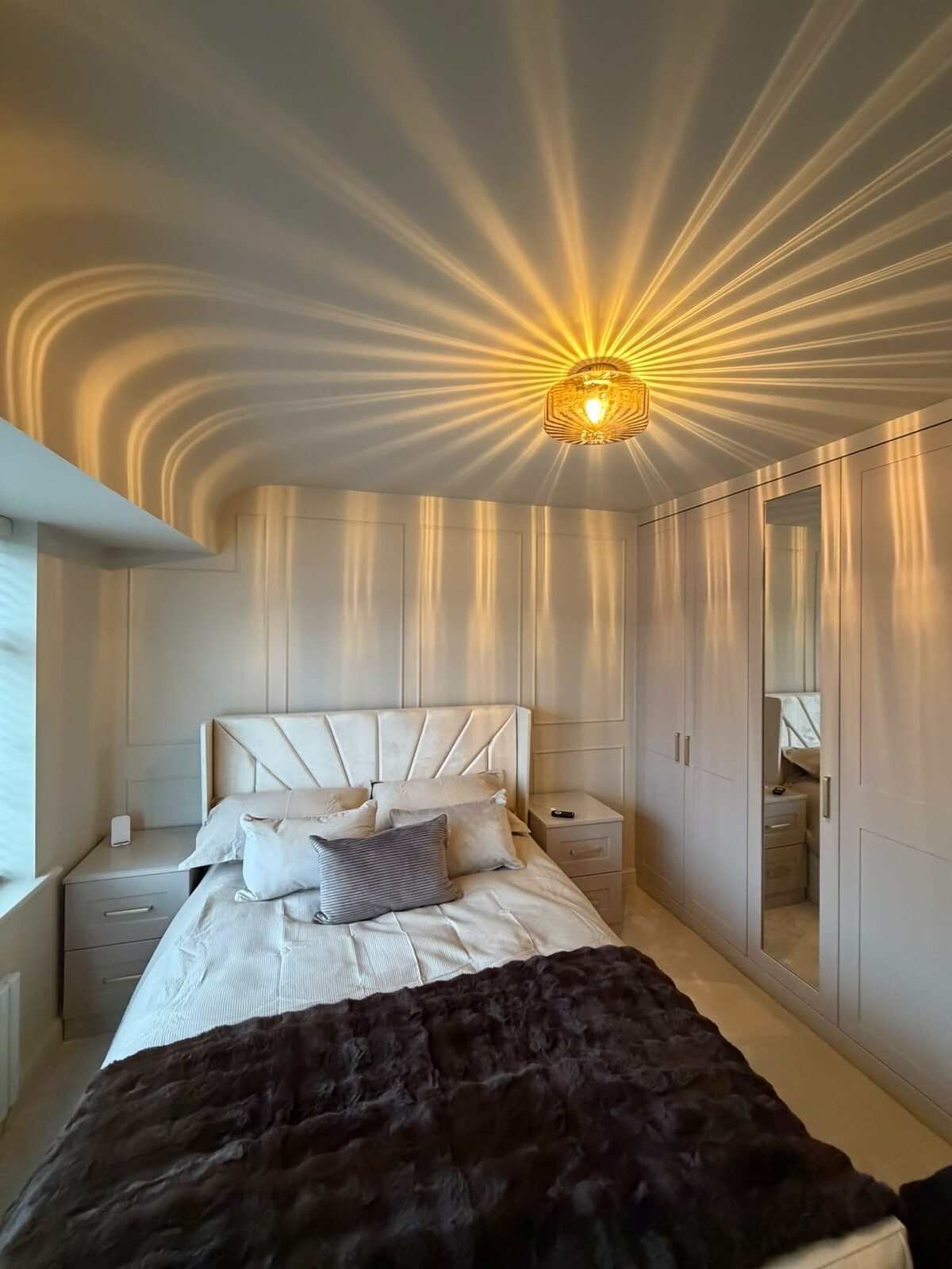 Bedroom after built in wardrobes with shaker doors and matching bedside drawers